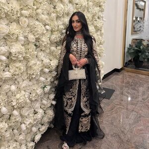 Shiza Hassan black suit long kameez with butterfly sleeve and ruffle pants